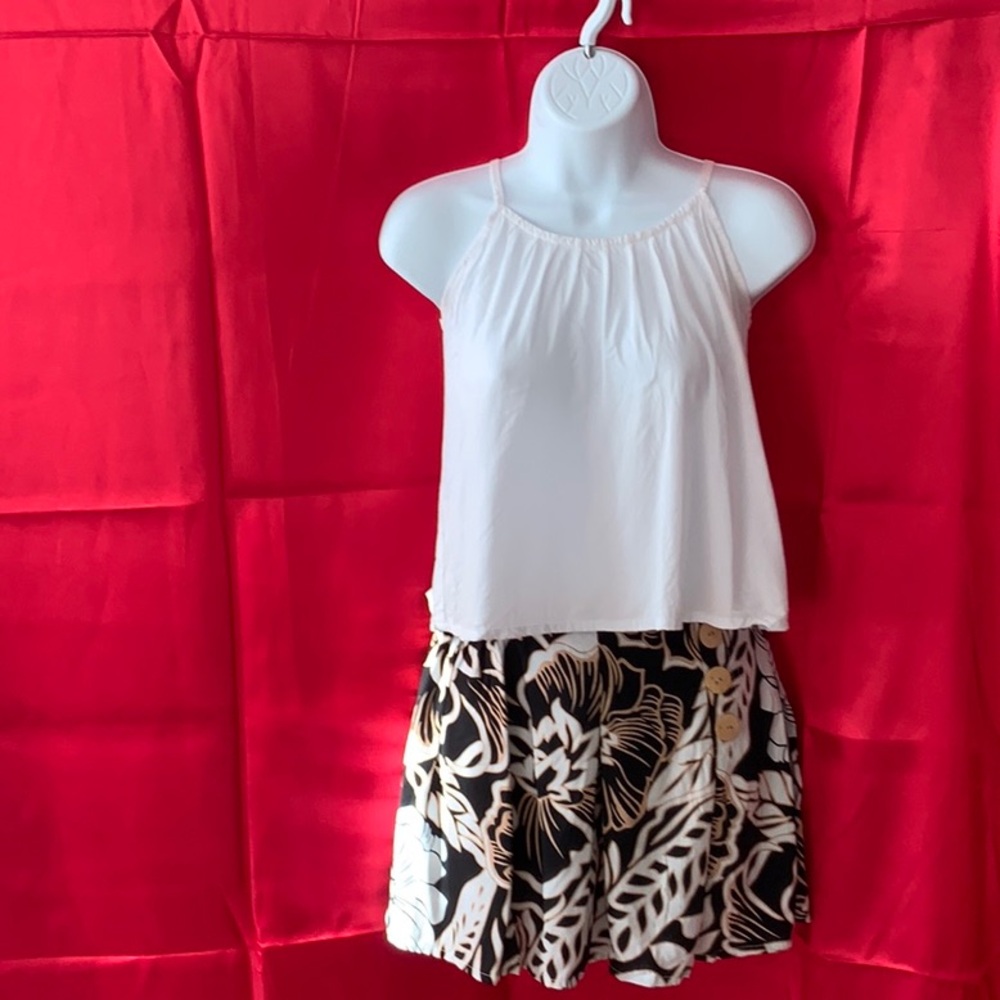 Two pieces: short pants and white blouse